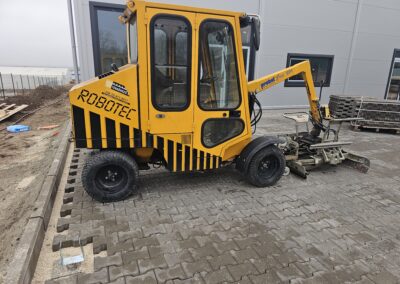 Sóskút térkőrakó gép